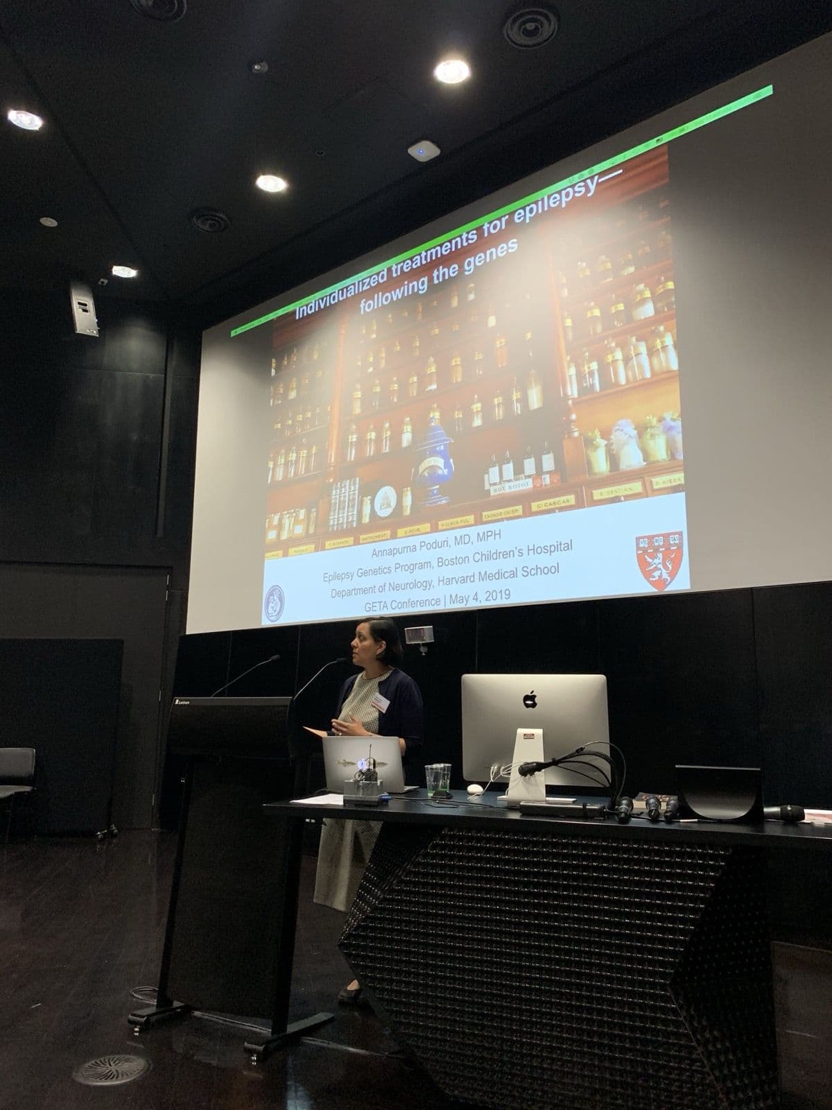 Assoc Prof Annapurna Poduri speaking at the lectern